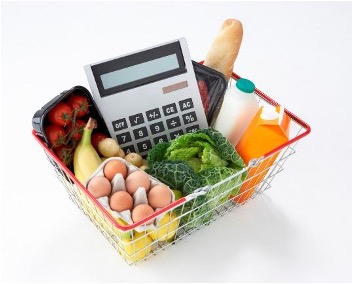 grocery cart with eggs and a calculator